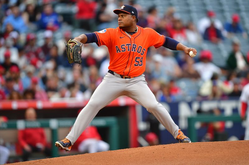 Jun 7, 2024; Anaheim, California, USA; Houston Astros pitcher Framber Valdez (59) throws against the Los Angeles Angels during the first inning at Angel Stadium. Mandatory Credit: Gary A. Vasquez-USA TODAY Sports