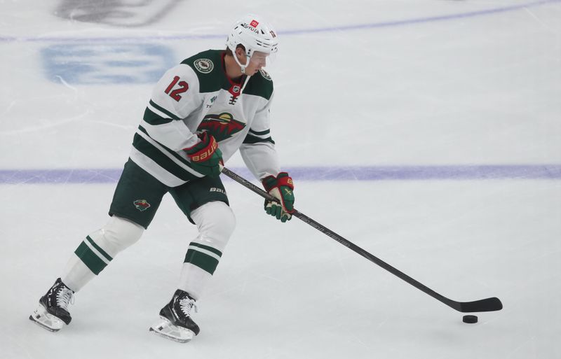 Oct 29, 2024; Pittsburgh, Pennsylvania, USA;  Minnesota Wild left wing Matt Boldy (12) warms up before the game against the Pittsburgh Penguins at PPG Paints Arena. Mandatory Credit: Charles LeClaire-Imagn Images