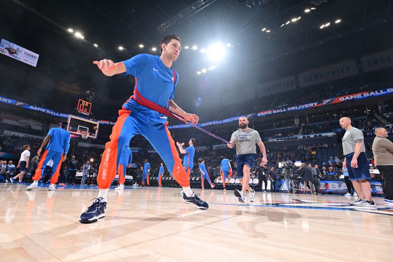 OKLAHOMA CITY, OK - APRIL 10:  Mike Muscala #50 of the Oklahoma City Thunder warms up before the game against the San Antonio Spurs on April 10, 2024 at Paycom Arena in Oklahoma City, Oklahoma. NOTE TO USER: User expressly acknowledges and agrees that, by downloading and or using this photograph, User is consenting to the terms and conditions of the Getty Images License Agreement. Mandatory Copyright Notice: Copyright 2024 NBAE (Photo by Logan Riely/NBAE via Getty Images)