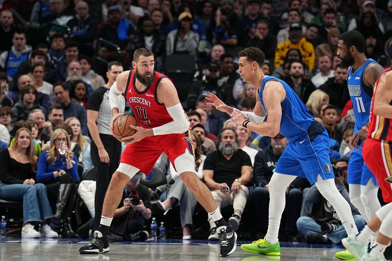 DALLAS, TX - JANUARY 13: Jonas Valanciunas #17 of the New Orleans Pelicans handles the ball during the game against the Dallas Mavericks on January 13, 2024 at the American Airlines Center in Dallas, Texas. NOTE TO USER: User expressly acknowledges and agrees that, by downloading and or using this photograph, User is consenting to the terms and conditions of the Getty Images License Agreement. Mandatory Copyright Notice: Copyright 2024 NBAE (Photo by Glenn James/NBAE via Getty Images)