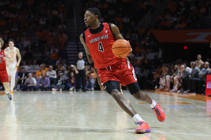 Dec 21, 2025; Knoxville, Tennessee, USA; Gardner-Webb Runnin' Bulldogs guard D.J. Jefferson (4) brings the ball up court against the Tennessee Volunteers during the second half at Thompson-Boling Arena at Food City Center. Mandatory Credit: Randy Sartin-Imagn Images