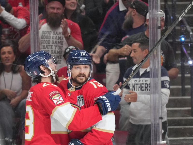 Jun 9, 2025; Sunrise, Florida, USA; Florida Panthers forward Sam Reinhart (13) celebrates scoring during the second period against the Edmonton Oilers in game three of the 2025 Stanley Cup Final at Amerant Bank Arena. Mandatory Credit: Sam Navarro-Imagn Images