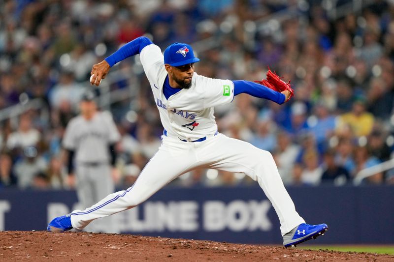 Jun 29, 2024; Toronto, Ontario, CAN; Toronto Blue Jays pitcher Jose Cuas (74) pitches against the New York Yankees during the ninth inning at Rogers Centre. Mandatory Credit: Kevin Sousa-USA TODAY Sports