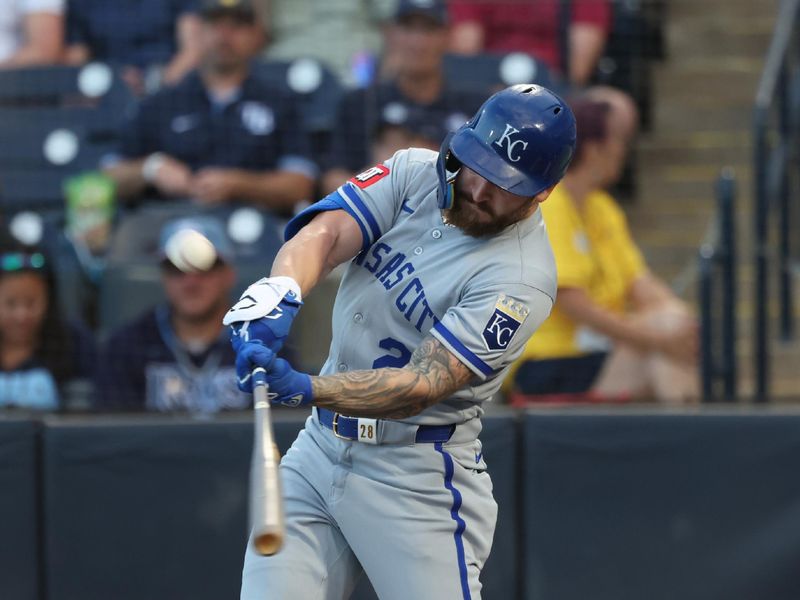 Apr 29, 2025; St. Petersburg, Florida, USA;  Kansas City Royals outfielder Kyle Isbel (28) hits a sacrifice RBI against the Tampa Bay Rays during the second inning at George M. Steinbrenner Field. Mandatory Credit: Kim Klement Neitzel-Imagn Images