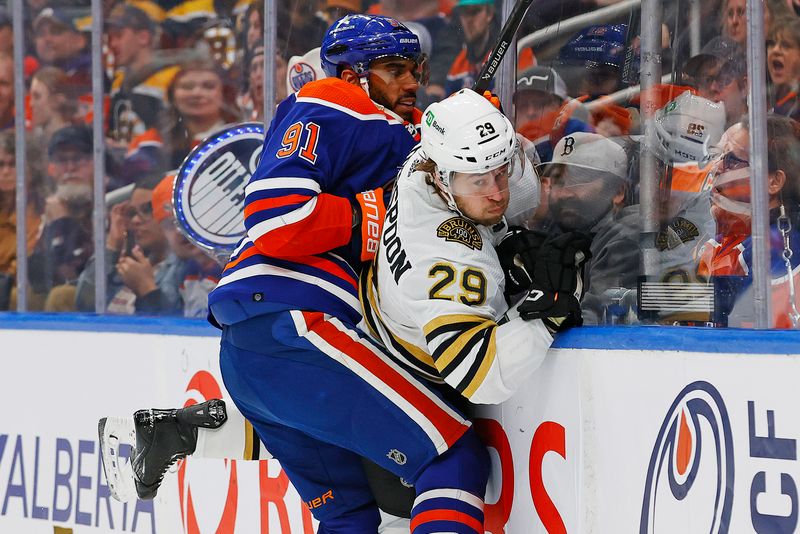 Feb 21, 2024; Edmonton, Alberta, CAN; Edmonton Oilers forward Evander Kane (91) checks Boston Bruins defensemen Parker Wotherspoon (29) during the first period at Rogers Place. Mandatory Credit: Perry Nelson-USA TODAY Sports