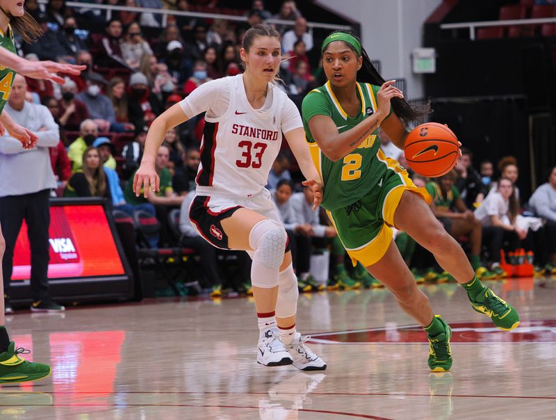 Jan 29, 2023; Stanford, California, USA; Oregon Ducks guard Chance Gray (2) controls the ball ahead of Stanford Cardinal guard Hannah Jump (33) during the second quarter at Maples Pavilion. Mandatory Credit: Kelley L Cox-USA TODAY Sports