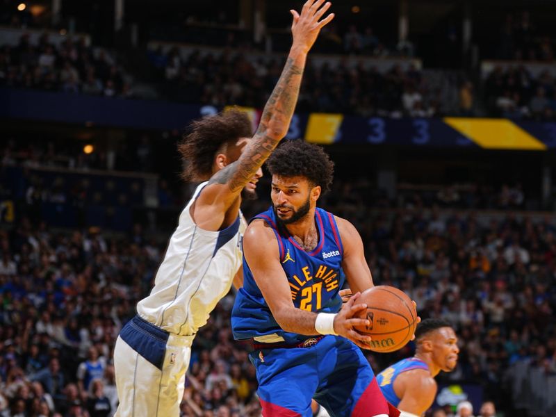 DENVER, CO - NOVEMBER 22: Jamal Murray #27 of the Denver Nuggets passes the ball during the game against the Dallas Mavericks during the Emirates NBA Cup game on November 22, 2024 at Ball Arena in Denver, Colorado. NOTE TO USER: User expressly acknowledges and agrees that, by downloading and/or using this Photograph, user is consenting to the terms and conditions of the Getty Images License Agreement. Mandatory Copyright Notice: Copyright 2024 NBAE (Photo by Garrett Ellwood/NBAE via Getty Images)