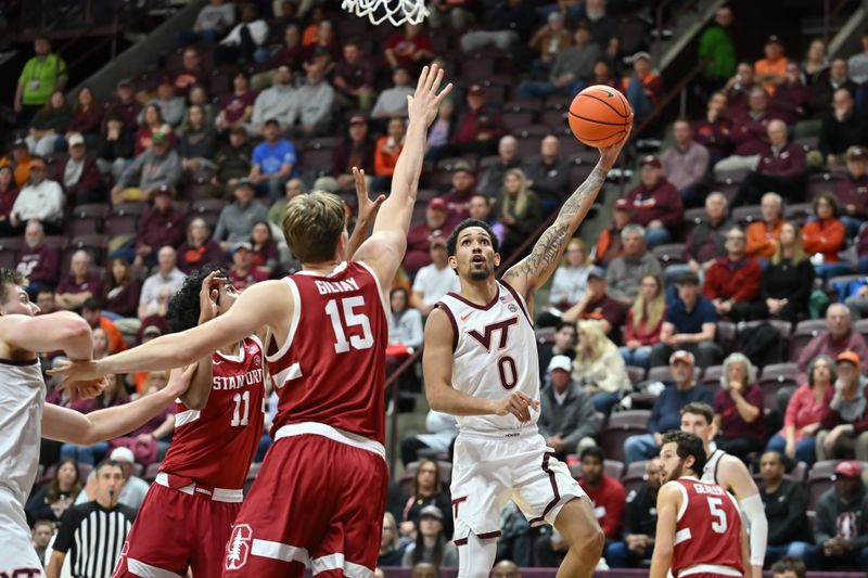 Jan 7, 2026; Blacksburg, Virginia, USA;  Virginia Tech Hokies guard Jailen Bedford (0) lays the ball up as Stanford Cardinal forward Oskar Giltay (15) defends during the first half at Cassell Coliseum. Mandatory Credit: Brian Bishop-Imagn Images