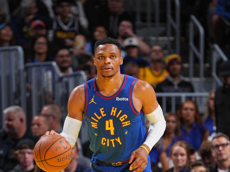 DENVER, CO - NOVEMBER 22: Russell Westbrook #4 of the Denver Nuggets dribbles the ball during the game against the Dallas Mavericks during the Emirates NBA Cup game on November 22, 2024 at Ball Arena in Denver, Colorado. NOTE TO USER: User expressly acknowledges and agrees that, by downloading and/or using this Photograph, user is consenting to the terms and conditions of the Getty Images License Agreement. Mandatory Copyright Notice: Copyright 2024 NBAE (Photo by Garrett Ellwood/NBAE via Getty Images)