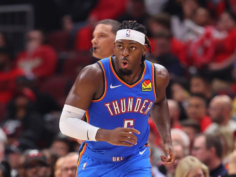 CHICAGO, ILLINOIS - OCTOBER 25: Luguentz Dort #5 of the Oklahoma City Thunder celebrates a three pointer against the Chicago Bulls during the second half at the United Center on October 25, 2023 in Chicago, Illinois. NOTE TO USER: User expressly acknowledges and agrees that, by downloading and or using this photograph, User is consenting to the terms and conditions of the Getty Images License Agreement. (Photo by Michael Reaves/Getty Images)