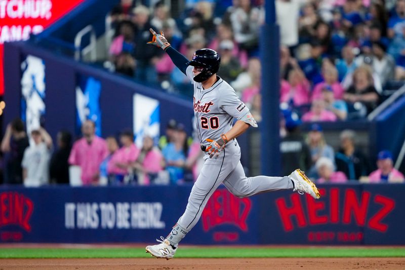 May 17, 2025; Toronto, Ontario, CAN; Detroit Tigers first base Spencer Torkelson (20) celebrates hitting a home run against the Toronto Blue Jays during the second inning in their MLB game at Rogers Centre. Mandatory Credit: Kevin Sousa-Imagn Images