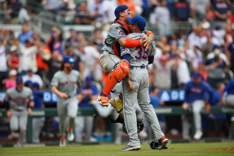 Sep 30, 2024; Atlanta, Georgia, USA; New York Mets catcher Francisco Alvarez (4) jumps onto relief pitcher Edwin Diaz (39) after a victory over the Atlanta Braves that clinched a wild card playoff birth at Truist Park. Mandatory Credit: Brett Davis-Imagn Images