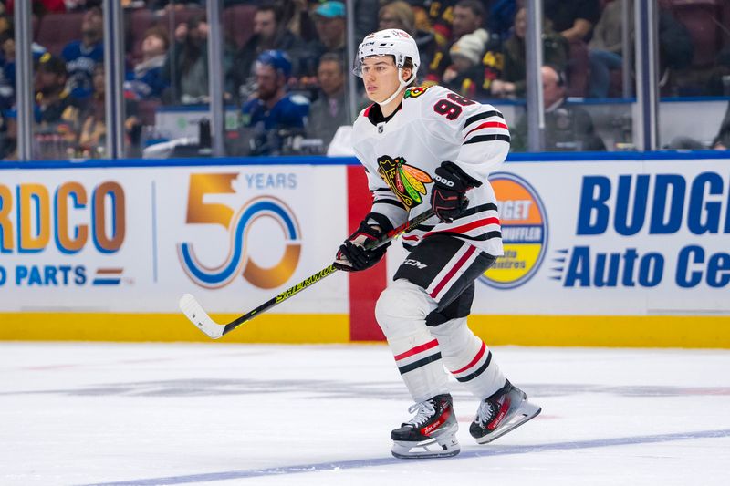 Nov 16, 2024; Vancouver, British Columbia, CAN; Chicago Blackhawks forward Connor Bedard (98) skates against the Vancouver Canucks during the first period at Rogers Arena. Mandatory Credit: Bob Frid-Imagn Images