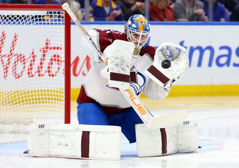 Dec 3, 2024; Buffalo, New York, USA; Colorado Avalanche goaltender Scott Wedgewood (41) makes a save during the second period against the Buffalo Sabres at KeyBank Center. Mandatory Credit: Timothy T. Ludwig-Imagn Images