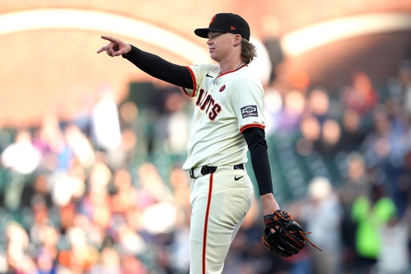 Jun 26, 2024; San Francisco, California, USA; San Francisco Giants starting pitcher Hayden Birdsong (60) gestures after a putout against the Chicago Cubs during the first inning at Oracle Park. Mandatory Credit: Darren Yamashita-USA TODAY Sports