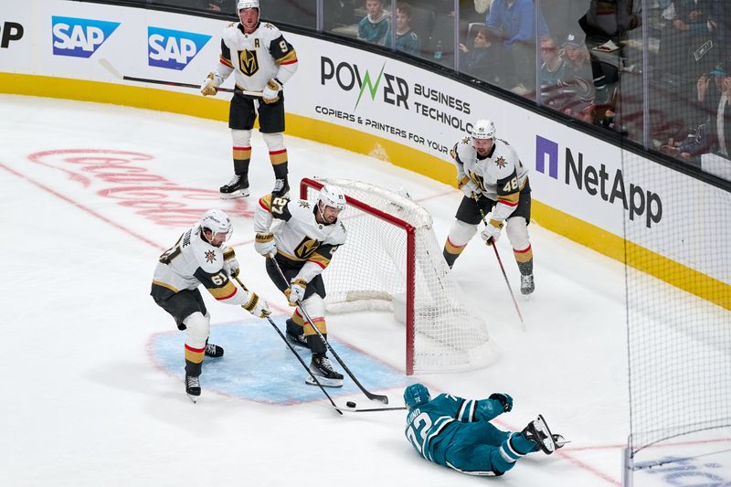 Oct 9, 2025; San Jose, California, USA; Vegas Golden Knights right wing Mark Stone (61) and defenseman Shea Theodore (27) defend against an empty net wraparound shot by San Jose Sharks left wing William Eklund (72) during the third period at SAP Center at San Jose. Mandatory Credit: Robert Edwards-Imagn Images