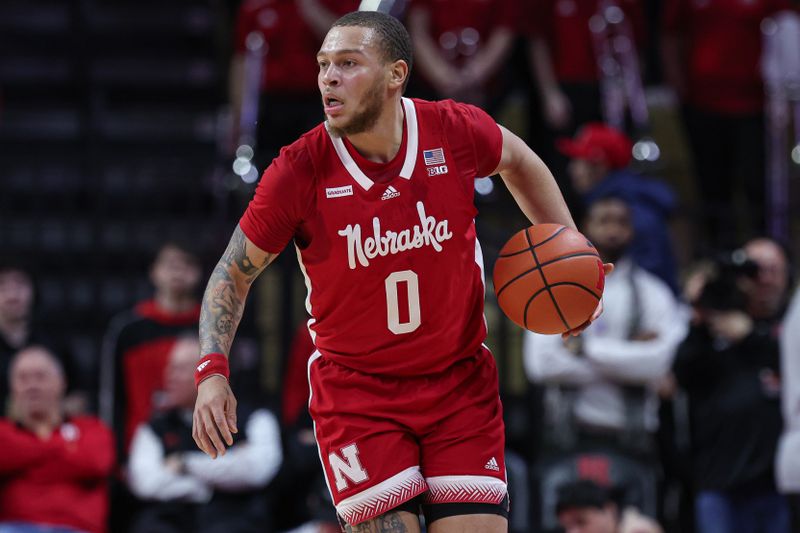 Jan 17, 2024; Piscataway, New Jersey, USA; Nebraska Cornhuskers guard C.J. Wilcher (0) dribbles up court  during the first half against the Rutgers Scarlet Knights at Jersey Mike's Arena. Mandatory Credit: Vincent Carchietta-USA TODAY Sports