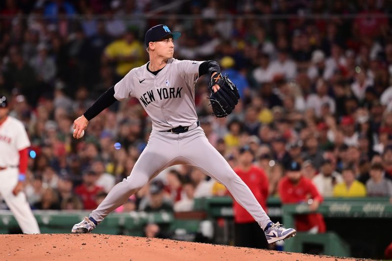 Jun 16, 2024; Boston, Massachusetts, USA; New York Yankees relief pitcher Luke Weaver (30) pitches against the Boston Red Sox during the seventh inning at Fenway Park. Mandatory Credit: Eric Canha-USA TODAY Sports