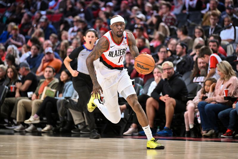 PORTLAND, OREGON - OCTOBER 18: Taze Moore #76 of the Portland Trail Blazers dribbles during the fourth quarter of the preseason game against the Utah Jazz at Moda Center on October 18, 2024 in Portland, Oregon. NOTE TO USER: User expressly acknowledges and agrees that, by downloading and or using this photograph, User is consenting to the terms and conditions of the Getty Images License Agreement. (Photo by Alika Jenner/Getty Images)