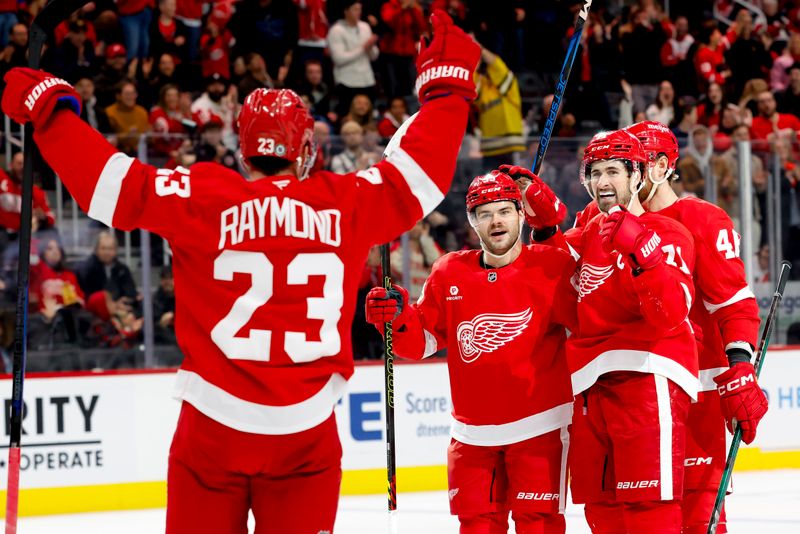 Dec 1, 2024; Detroit, Michigan, USA;  Detroit Red Wings right wing Alex DeBrincat (93) receives congratulations from teammates after scoring in the second period against the Vancouver Canucks at Little Caesars Arena. Mandatory Credit: Rick Osentoski-Imagn Images