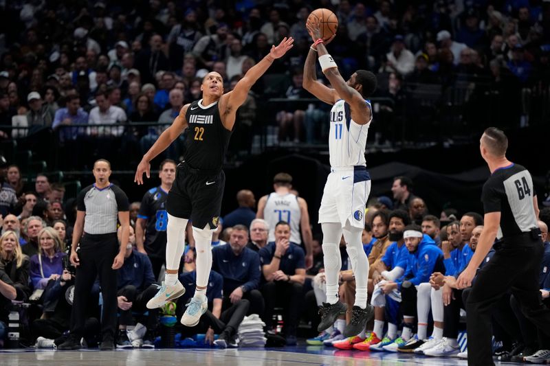 DALLAS, TEXAS - JANUARY 09: Kyrie Irving #11 of the Dallas Mavericks shoots as Desmond Bane #22 of the Memphis Grizzlies defends during the second half at American Airlines Center on January 09, 2024 in Dallas, Texas. NOTE TO USER: User expressly acknowledges and agrees that, by downloading and or using this photograph, User is consenting to the terms and conditions of the Getty Images License Agreement. (Photo by Sam Hodde/Getty Images)