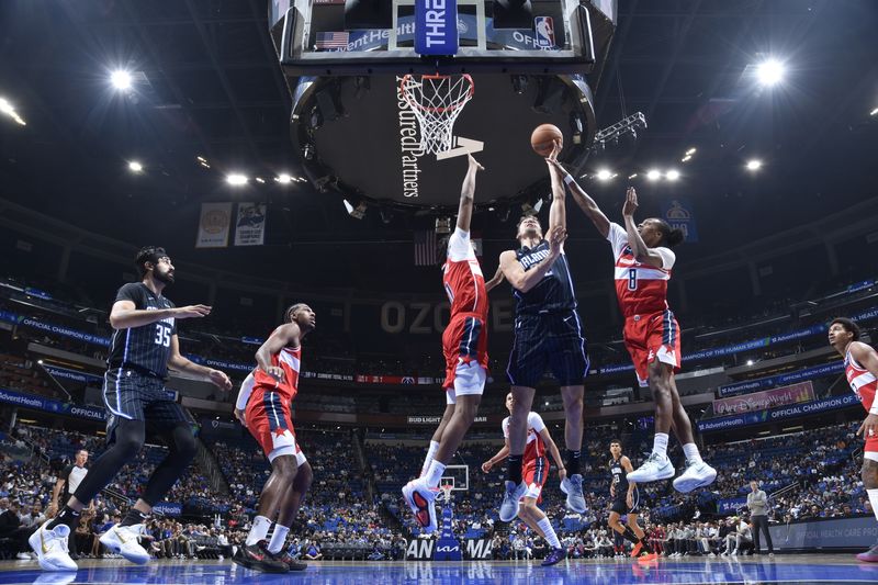 ORLANDO, FL - NOVMEBER 10: Franz Wagner #22 of the Orlando Magic shoots the ball during the game against the Washington Wizards on November 10, 2024 at Kia Center in Orlando, Florida. NOTE TO USER: User expressly acknowledges and agrees that, by downloading and or using this photograph, User is consenting to the terms and conditions of the Getty Images License Agreement. Mandatory Copyright Notice: Copyright 2024 NBAE (Photo by Fernando Medina/NBAE via Getty Images)