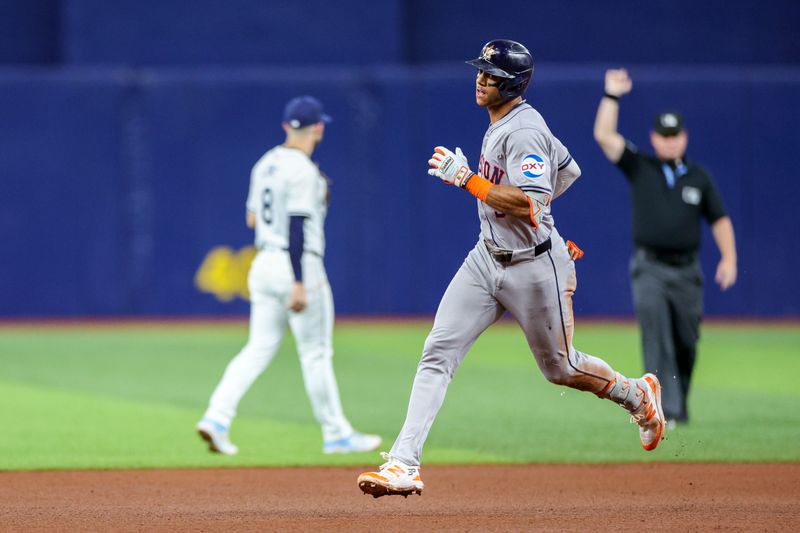 Aug 13, 2024; St. Petersburg, Florida, USA; Houston Astros shortstop Jeremy Pena (3) runs the bases after hitting a home run against the Tampa Bay Rays in the sixth inning  at Tropicana Field. Mandatory Credit: Nathan Ray Seebeck-USA TODAY Sports