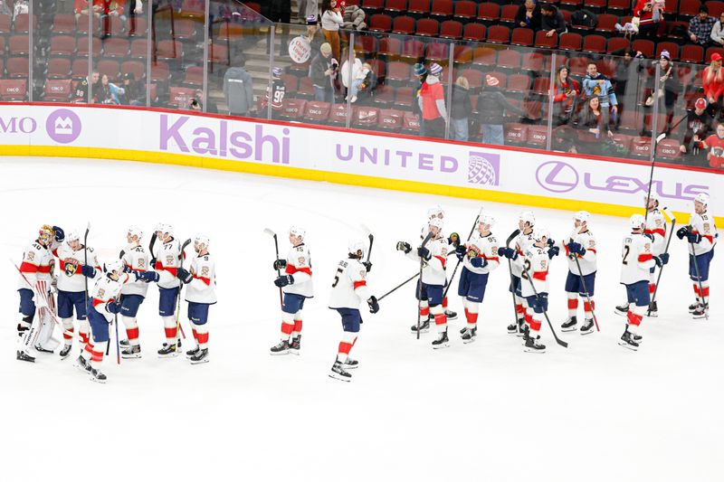 Jan 25, 2026; Chicago, Illinois, USA; Florida Panthers players celebrate after defeating the Chicago Blackhawks at United Center. Mandatory Credit: Kamil Krzaczynski-Imagn Images