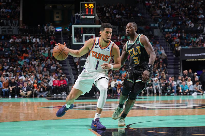 CHARLOTTE, NC - MARCH 1: Devin Booker #1 of the Phoenix Suns drives to the basket against the Charlotte Hornets on March 1, 2023 at Spectrum Center in Charlotte, North Carolina. NOTE TO USER: User expressly acknowledges and agrees that, by downloading and or using this photograph, User is consenting to the terms and conditions of the Getty Images License Agreement. Mandatory Copyright Notice: Copyright 2023 NBAE (Photo by Jesse D. Garrabrant/NBAE via Getty Images)