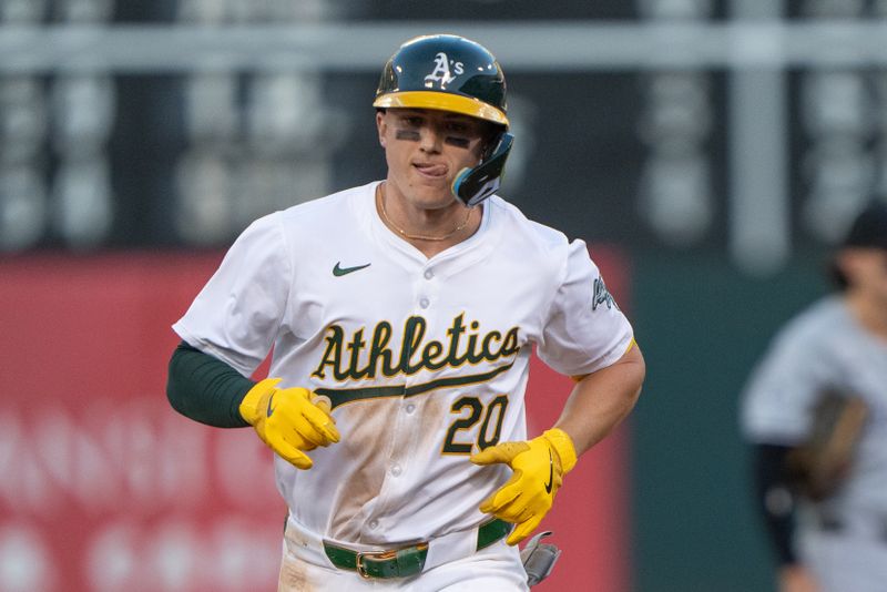 Aug 6, 2024; Oakland, California, USA;  Oakland Athletics second base Zack Gelof (20) runs the bases after hitting a solo home run during the fourth inning against the Chicago White Sox at Oakland-Alameda County Coliseum. Mandatory Credit: Stan Szeto-USA TODAY Sports