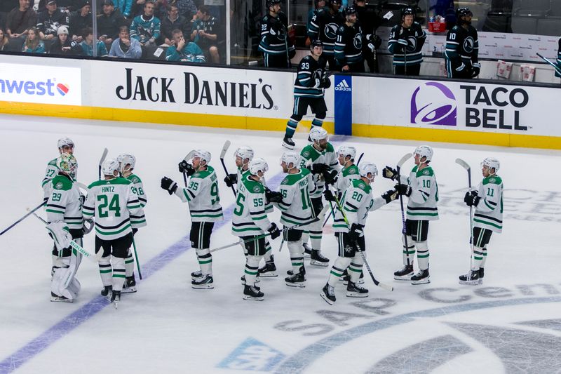 Mar 5, 2024; San Jose, California, USA; The Dallas Stars celebrate their 7-6 win over the San Jose Sharks at SAP Center at San Jose. Mandatory Credit: John Hefti-USA TODAY Sports