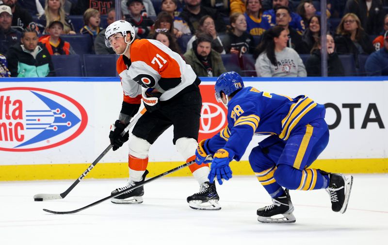 Apr 5, 2024; Buffalo, New York, USA;  Buffalo Sabres defenseman Jacob Bryson (78) tries to block a shot by Philadelphia Flyers right wing Tyson Foerster (71) during the third period at KeyBank Center. Mandatory Credit: Timothy T. Ludwig-USA TODAY Sports