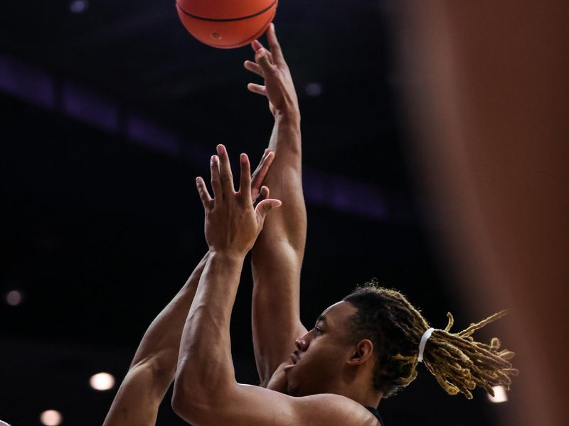 Jan 27, 2025; Tucson, Arizona, USA; Iows State Cyclones center Dishon Jackson (1) shoots the ball while Arizona Wildcats forward Tobe Awaka (30) fails to block during the first half at McKale Center. Mandatory Credit: Aryanna Frank-Imagn Images