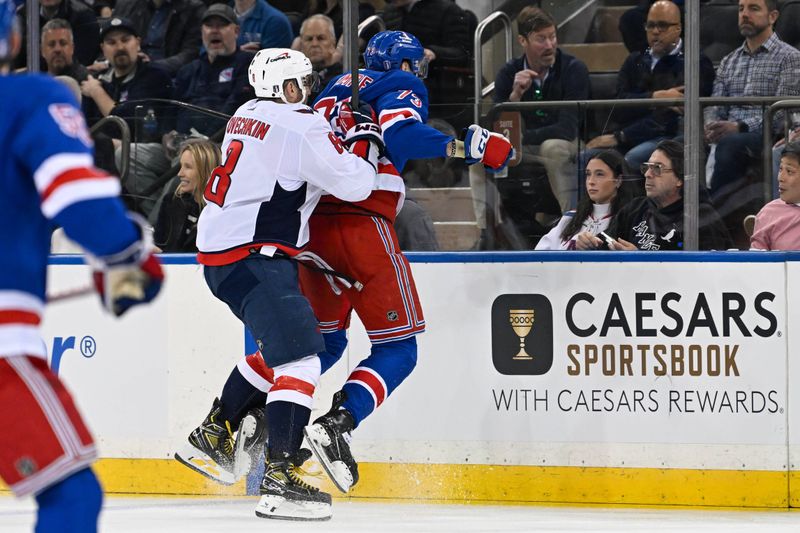 Apr 23, 2024; New York, New York, USA;  Washington Capitals left wing Alex Ovechkin (8) checks New York Rangers center Matt Rempe (73) during the second period in game two of the first round of the 2024 Stanley Cup Playoffs at Madison Square Garden. Mandatory Credit: Dennis Schneidler-USA TODAY Sports