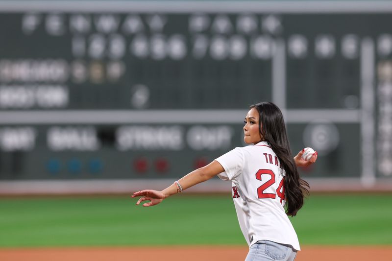 Sep 7, 2024; Boston, Massachusetts, USA; Bachelorette Jenn Tran throws out the first pitch at Fenway Park before a game between the Chicago White Sox and the Boston Red Sox. Mandatory Credit: Paul Rutherford-Imagn Images