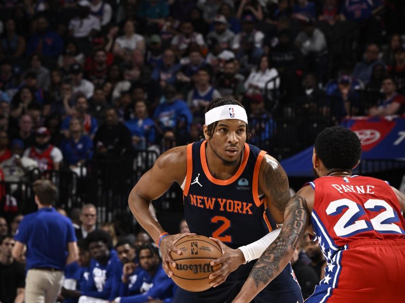 PHILADELPHIA, PA - APRIL 28: Miles McBride #2 of the New York Knicks looks to pass the ball during the game against the Philadelphia 76ers during Round 1 Game 4 of the 2024 NBA Playoffs on April 28, 2024 at the Wells Fargo Center in Philadelphia, Pennsylvania NOTE TO USER: User expressly acknowledges and agrees that, by downloading and/or using this Photograph, user is consenting to the terms and conditions of the Getty Images License Agreement. Mandatory Copyright Notice: Copyright 2024 NBAE (Photo by David Dow/NBAE via Getty Images)