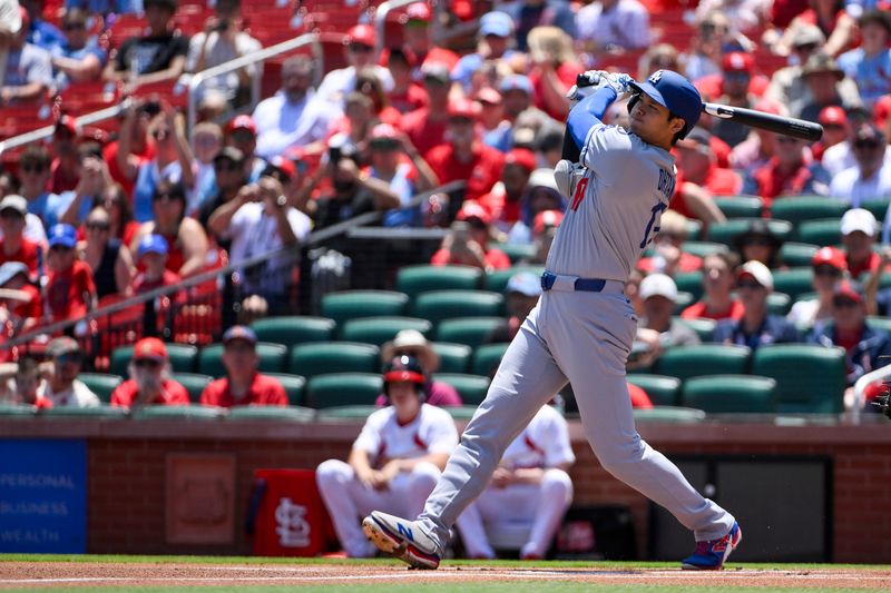 Jun 8, 2025; St. Louis, Missouri, USA;  Los Angeles Dodgers designated hitter Shohei Ohtani (17) hits a double against the St. Louis Cardinals during the first inning at Busch Stadium. Mandatory Credit: Jeff Curry-Imagn Images