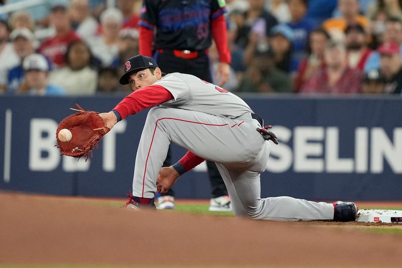 Sep 23, 2024; Toronto, Ontario, CAN; Boston Red Sox first baseman Triston Casas (36) makes an out during the first inning against the Toronto Blue Jays at Rogers Centre. Mandatory Credit: John E. Sokolowski-Imagn Images