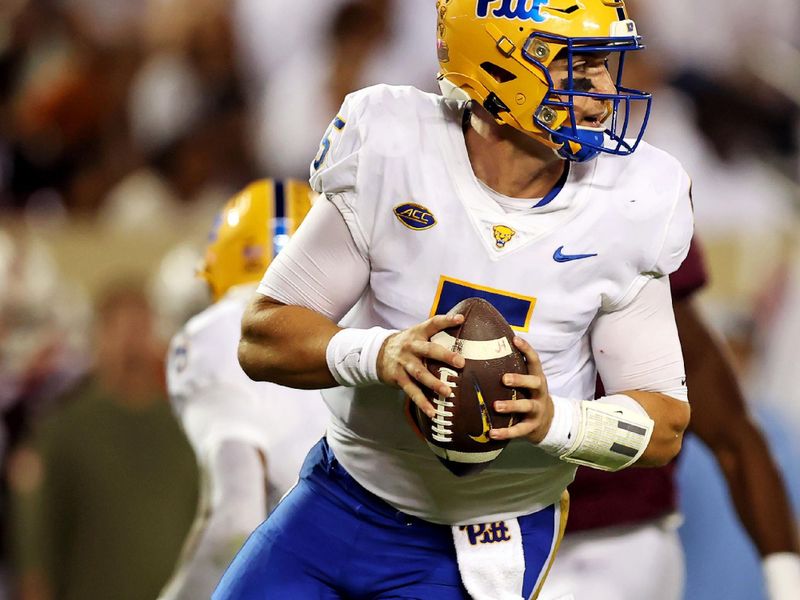 Sep 30, 2023; Blacksburg, Virginia, USA; Pittsburgh Panthers quarterback Phil Jurkovec (5) drops to pass during the second quarter against the Virginia Tech Hokies at Lane Stadium. Mandatory Credit: Peter Casey-USA TODAY Sports