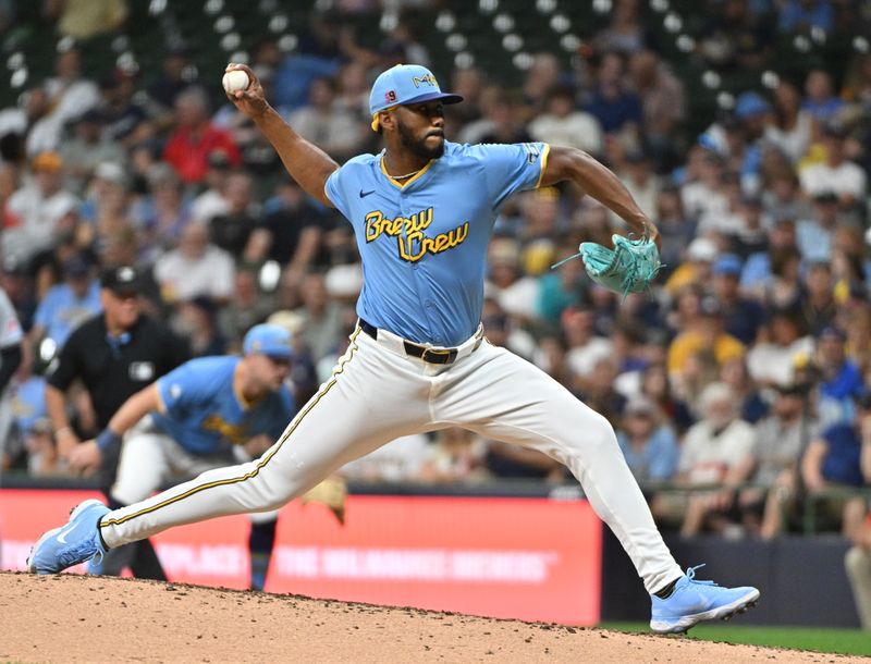 Aug 16, 2024; Milwaukee, Wisconsin, USA; Milwaukee Brewers pitcher Elvis Peguero (59) delivers a pitch against the Cleveland Guardians in the seventh inning at American Family Field. Mandatory Credit: Michael McLoone-USA TODAY Sports