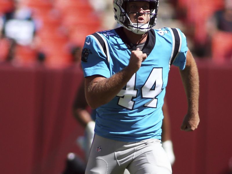 Carolina Panthers long snapper J.J. Jansen (44) runs during an NFL football game against the Washington Commanders, Saturday, Aug. 13, 2022 in Landover. (AP Photo/Daniel Kucin Jr.)