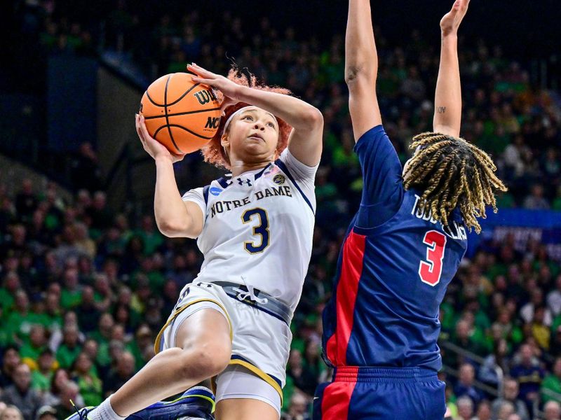 Mar 25, 2024; South Bend, Indiana, USA; Notre Dame Fighting Irish guard Hannah Hidalgo (3) goes up for a shot as Ole Miss Rebels guard Kennedy Todd-Williams (3) defends in the second half of the NCAA Tournament second round game at the Purcell Pavilion. Mandatory Credit: Matt Cashore-USA TODAY Sports