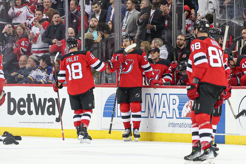 Mar 7, 2024; Newark, New Jersey, USA; New Jersey Devils right wing Timo Meier (28) celebrates his third goal with teammates of the game during the second period against the St. Louis Blues at Prudential Center. Mandatory Credit: Vincent Carchietta-USA TODAY Sports