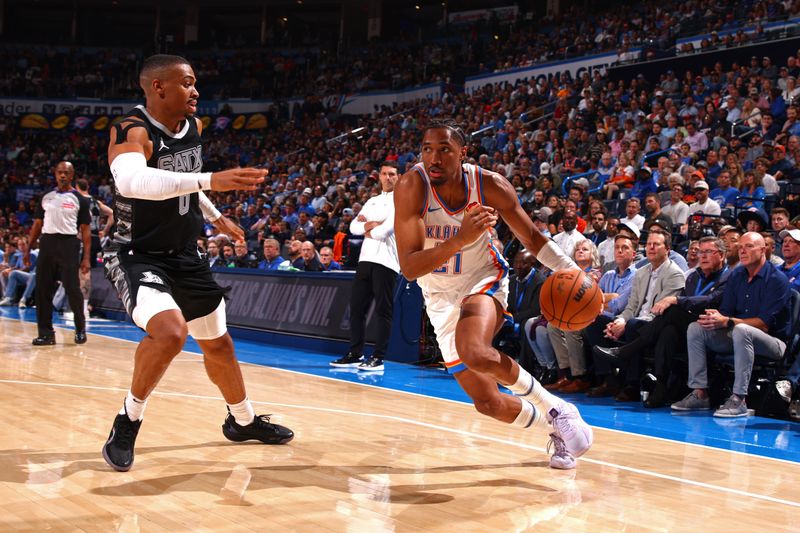 OKLAHOMA CITY, OK - OCTOBER 30: Aaron Wiggins #21 of the Oklahoma City Thunder handles the ball during the game against the San Antonio Spurs on October 30, 2024 at Paycom Arena in Oklahoma City, Oklahoma. NOTE TO USER: User expressly acknowledges and agrees that, by downloading and or using this photograph, User is consenting to the terms and conditions of the Getty Images License Agreement. Mandatory Copyright Notice: Copyright 2024 NBAE (Photo by Zach Beeker/NBAE via Getty Images)