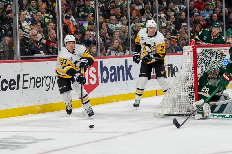 Feb 9, 2024; Saint Paul, Minnesota, USA; Pittsburgh Penguins right wing Rickard Rakell (67) in action against the Minnesota Wild in the third period at Xcel Energy Center. Mandatory Credit: Matt Blewett-USA TODAY Sports