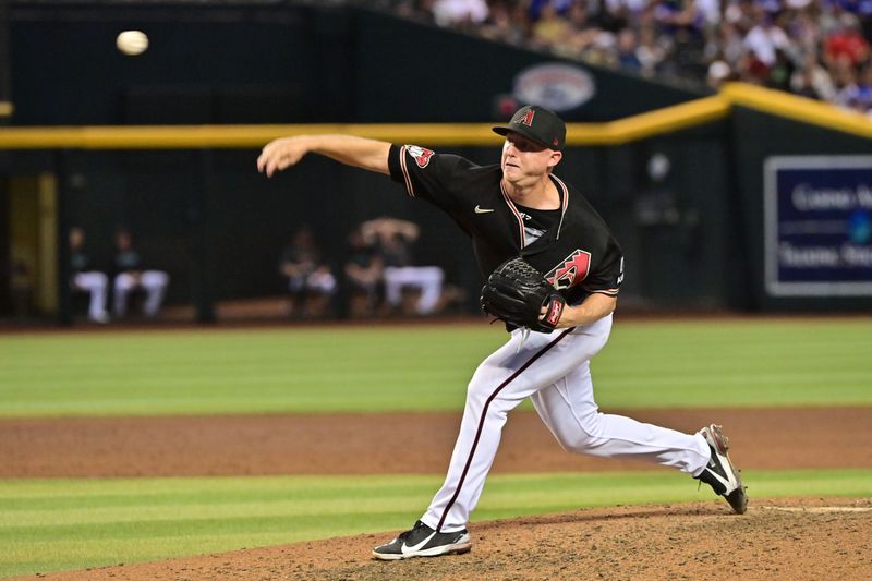 Aug 9, 2023; Phoenix, Arizona, USA;  Arizona Diamondbacks relief pitcher Scott McGough (30) throws in the ninth inning against the Los Angeles Dodgers at Chase Field. Mandatory Credit: Matt Kartozian-USA TODAY Sports