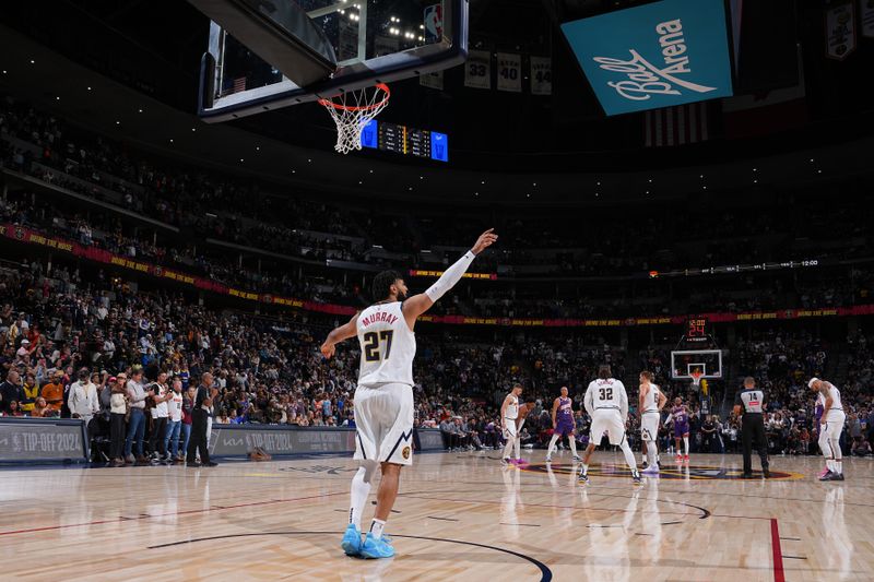 DENVER, CO - OCTOBER 13: Jamal Murray #27 of the Denver Nuggets looks on during the game against the Phoenix Suns on October 13, 2024 at Ball Arena in Denver, Colorado. NOTE TO USER: User expressly acknowledges and agrees that, by downloading and/or using this Photograph, user is consenting to the terms and conditions of the Getty Images License Agreement. Mandatory Copyright Notice: Copyright 2024 NBAE (Photo by Garrett Ellwood/NBAE via Getty Images)