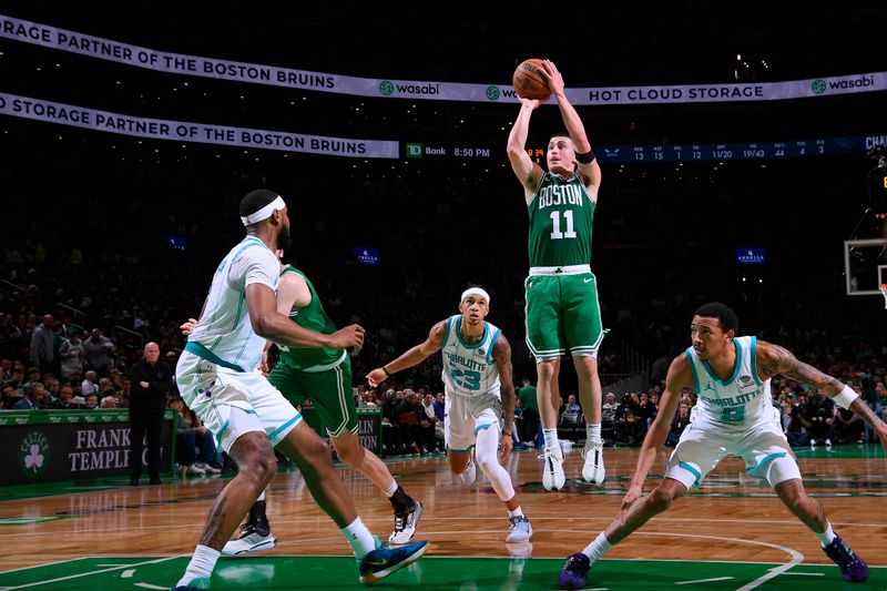 BOSTON, MA - APRIL 12:  Payton Pritchard #11 of the Boston Celtics  shoots the ball during the game against the Charlotte Hornets on April 12, 2024 at the TD Garden in Boston, Massachusetts. NOTE TO USER: User expressly acknowledges and agrees that, by downloading and or using this photograph, User is consenting to the terms and conditions of the Getty Images License Agreement. Mandatory Copyright Notice: Copyright 2024 NBAE  (Photo by Brian Babineau/NBAE via Getty Images)