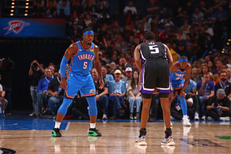 OKLAHOMA CITY, OK - APRIL 9: Luguentz Dort #5 of the Oklahoma City Thunder plays defense during the game against the Sacramento Kings on April 9, 2024 at Paycom Arena in Oklahoma City, Oklahoma. NOTE TO USER: User expressly acknowledges and agrees that, by downloading and or using this photograph, User is consenting to the terms and conditions of the Getty Images License Agreement. Mandatory Copyright Notice: Copyright 2024 NBAE (Photo by Zach Beeker/NBAE via Getty Images)