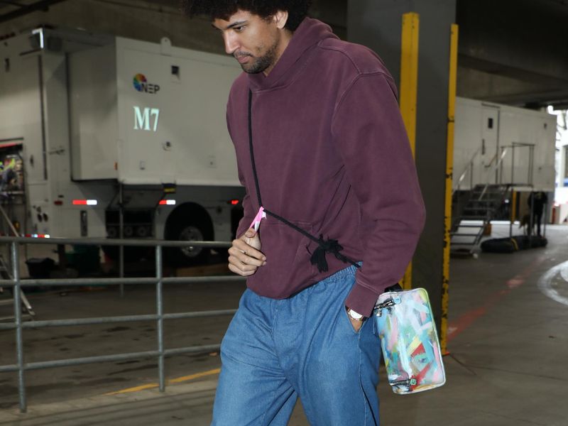 PORTLAND, OR - MARCH 11: Matisse Thybulle #4 of the Portland Trail Blazers arrives to the arena before the game against the Boston Celtics on March 11, 2024 at the Moda Center Arena in Portland, Oregon. NOTE TO USER: User expressly acknowledges and agrees that, by downloading and or using this photograph, user is consenting to the terms and conditions of the Getty Images License Agreement. Mandatory Copyright Notice: Copyright 2024 NBAE (Photo by Cameron Browne/NBAE via Getty Images)